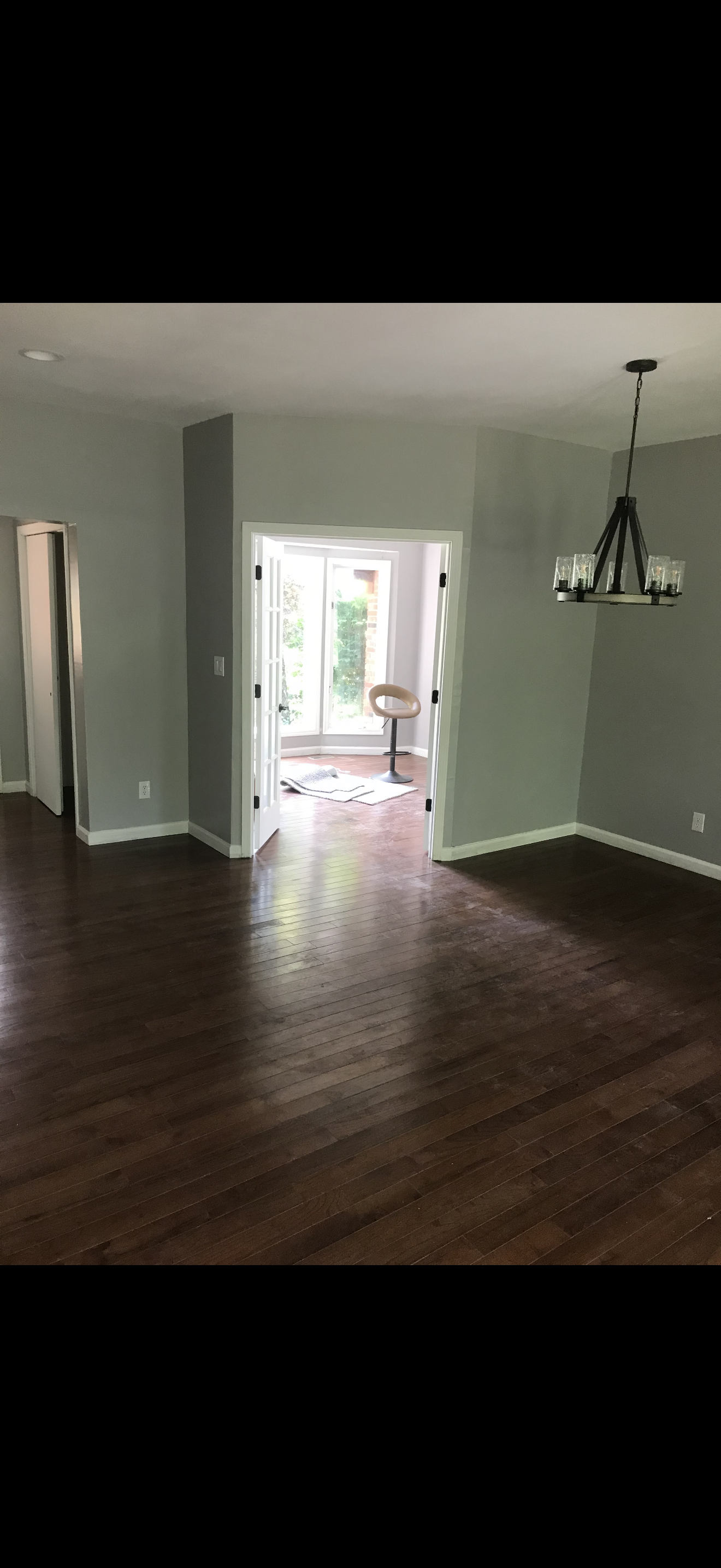 Flooring installation: new flooring being installed for a clean, seamless look across the room.